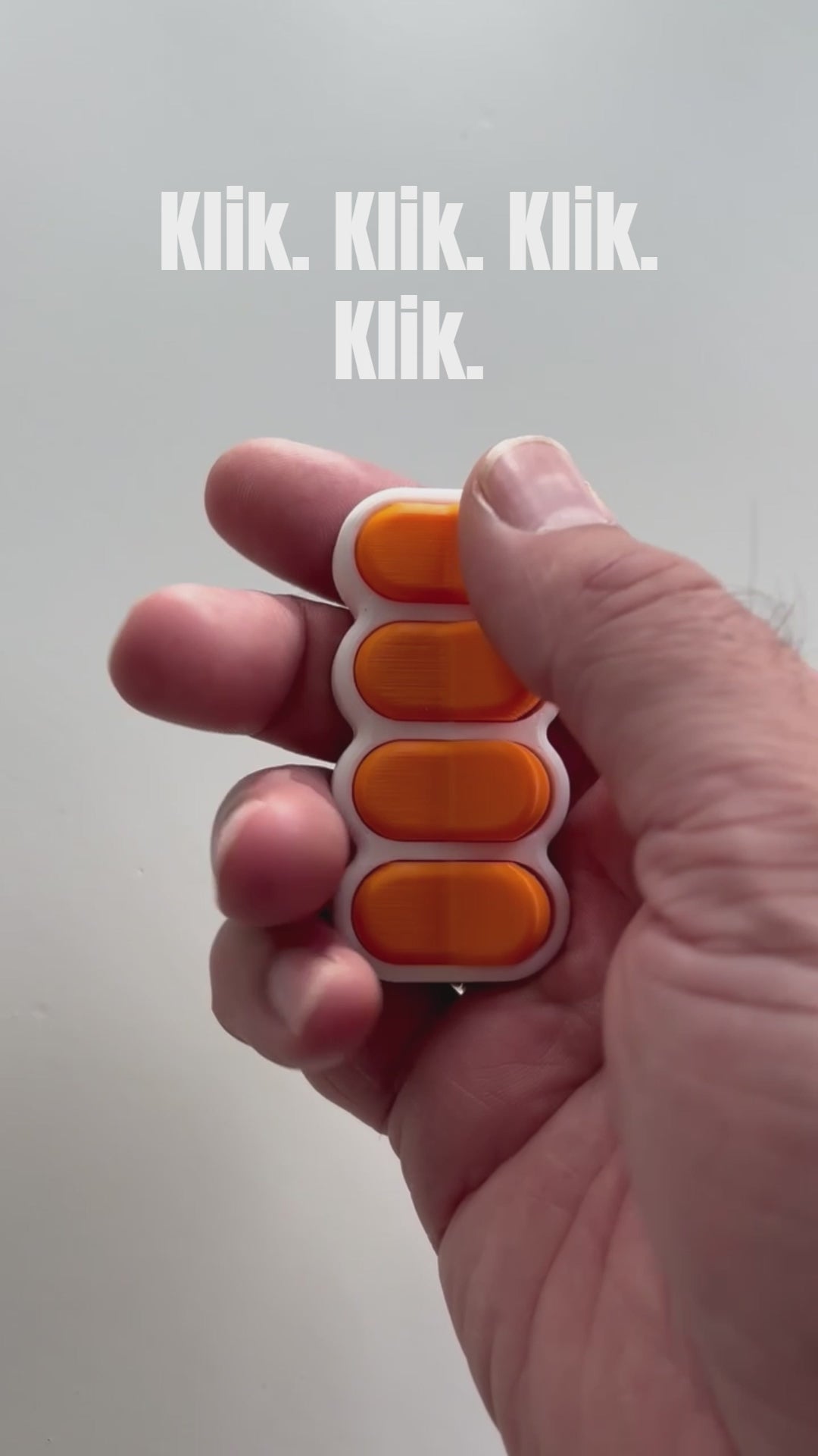 Bradey Clickkey fidget clicker 4 knoppen wit oranje